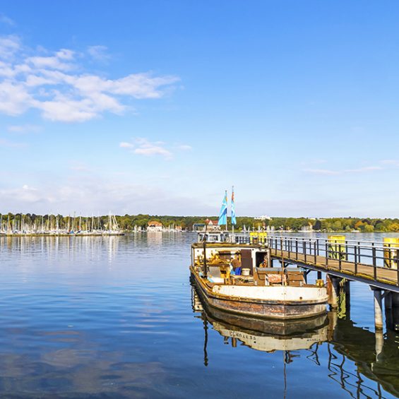 Boat piers on Wannsee lake in Berlin, Germany. Wannsee (or Grosser Wannsee) is a bight of the Havel river near the locality of Wannsee and Nikolassee in the borough of Steglitz-Zehlendorf in Berlin